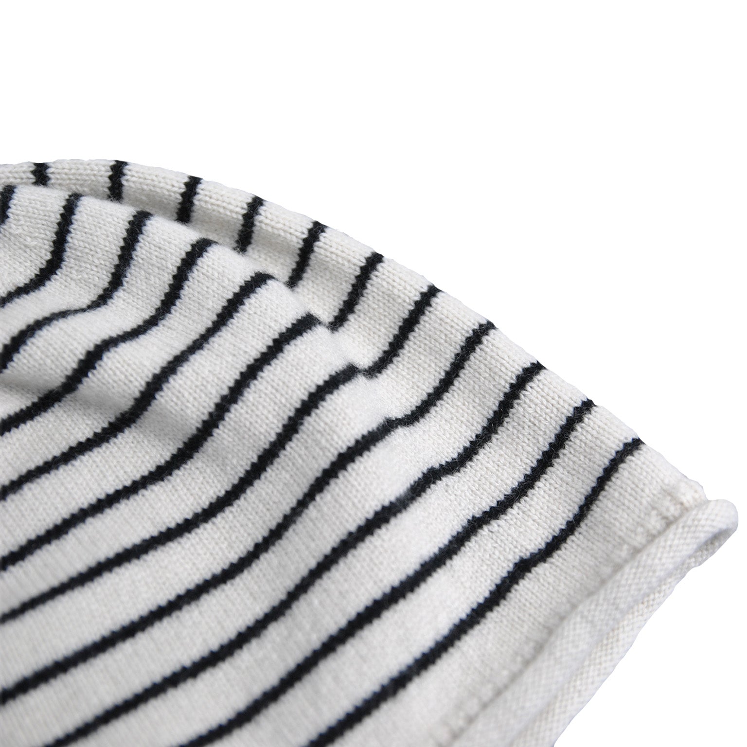 Close up of a Cream Knit Beanie with Black Stripes