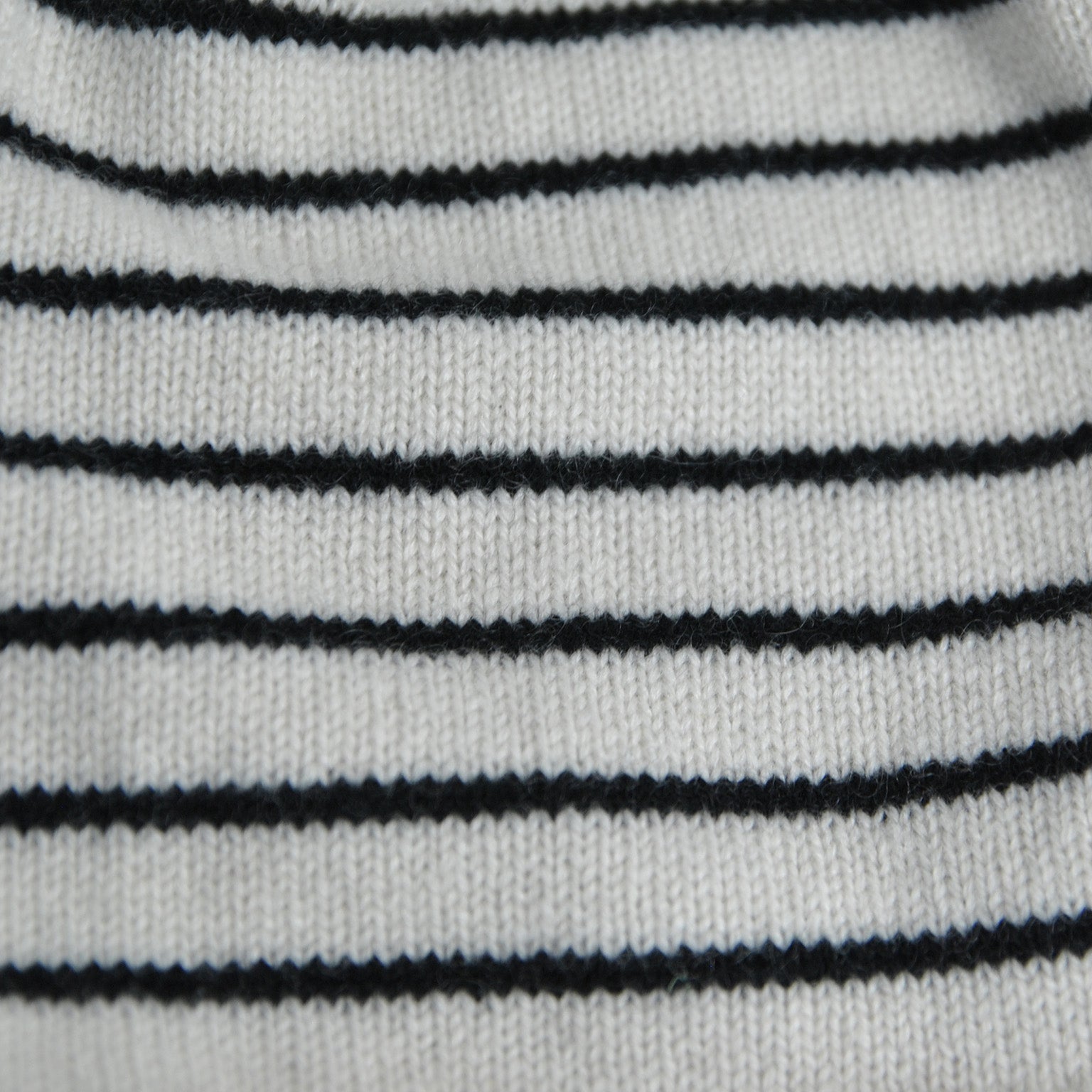 Close up of Cream Knit Beanie with Black Stripes